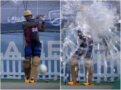 KKR batsman shot in nets shatters camera glass during net session Watch video here | IPL 2020: प्रैक्टिस के दौरान आंद्रे रसेल ने खेला ऐसा खतरनाक शॉट कि टूट गया कैमरे का लेंस, वीडियो वायरल