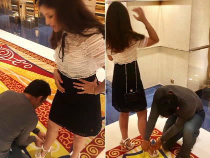 MS Dhoni helpes his wife Sakshi tie the laces of her new pair of shoes, pics goes viral | धोनी ने शॉपिंग के दौरान की साक्षी को नई सैंडल पहनने में मदद, हुई जमकर तारीफ, वायरल हुईं तस्वीरें