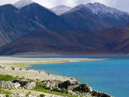 China intensifies activities in its occupied part of Pangog Tso jetty built for boat operations | पैंगोग त्सो के अपने कब्जे वाले हिस्से में चीन ने तेज की गतिविधियां, नावों के परिचालन के लिए बनाई जेटी