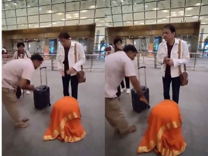 Seeing Arun Govil Ramayana TV woman fell at feet at airport watch Shri Ram viral video | देखें वीडियो: टीवी वाले रामायण के अरुण गोविल को देखते हुए महिला गिरी चरणों में, ‘श्री राम’ समझ उठने का नहीं ले रही थी नाम