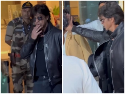 Shahrukh Khan jerks fan's hand while trying to take selfie video surfaced | शाहरुख खान ने सेल्फी लेने की कोशिश कर रहे फैन का हाथ झटका, वीडियो देख लोगों ने यूं किया रिएक्ट