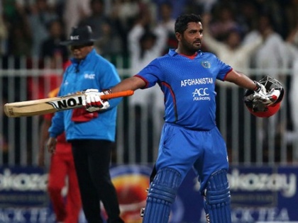 India vs Afghanistan: mohammad shahzad score 124 runs against india in Asia cup super 4 match | Asia Cup: टीम इंडिया के खिलाफ मोहम्मद शहजाद ने लगाए 7 छक्के और 11 चौके, जड़ा तूफानी शतक