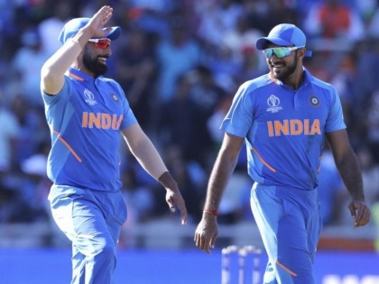 ICC World Cup 2019: India vs West Indies, Mohammed Shami, Virat Kohli, imitates Sheldon Cottrell salute and march celebration | IND vs WI: मोहम्मद शमी ने की विंडीज गेंदबाज शेल्डन कॉटरेल के 'सैल्यूट' जश्न की नकल, कोहली ने भी दिया साथ, देखें वीडियो