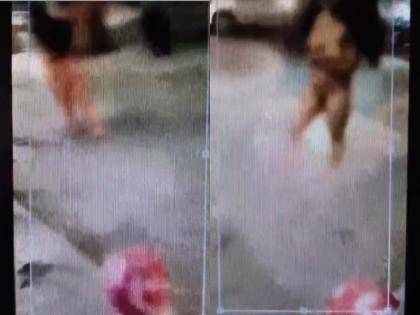 woman was seen roaming naked on the road in Ghaziabad video viral | गाजियाबाद में सड़क पर नग्न अवस्था में घूमती दिखी महिला, राहगीरों के उड़े होश; वीडियो वायरल
