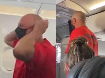 Viral video a man was seen misbehaving in flight, got angry and chewed his own mask | फ्लाइट में बदतमीजी करता हुआ दिखा एक शख्स, गुस्से में आकर चबाया खुद का मास्क