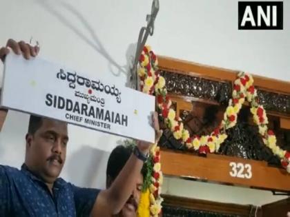 Siddaramaiah name plate installed in karnataka Vidhan Soudha after taking oath CM supporters raise slogans video | WATCH: सीएम पद की शपथ लेते ही 'विधानसौधा' में लगाई गई सिद्धारमैया की नेम प्लेट, फूलों से सजाया गया, समर्थकों ने की नारेबाजी