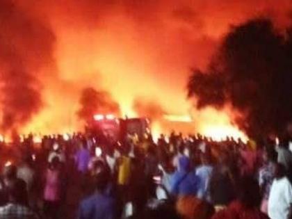 Sierra Leone Blast Fuel tanker blast claims 92 lives another 100 rushed to hospitals watch video | Sierra Leone Blast: तेल टैंकर में विस्फोट, ट्रक ने टैंकर को मारी टक्कर, 92 लोग जिंदा जले, 100 अस्पताल में भर्ती, देखें वीडियो Sierra Leone Blast Fuel tanker blast claims 92 lives another 100 rushed to hospitals watch video | Sierra Leone Blast: तेल टैंकर में विस्फोट, ट्रक ने टैंकर को मारी टक्कर, 92 लोग जिंदा जले, 100 अस्पताल में भर्ती, देखें वीडियो