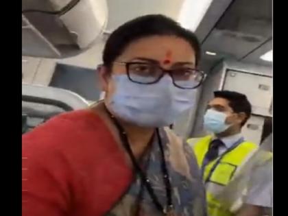 Smriti Irani's face-off with congress leader in flight on petrol, diesel and lpg price hike, watch video | स्मृति ईरानी को जब फ्लाइट में रोककर कांग्रेस की नेता पूछने लगीं पेट्रोल-डीजल और गैस के दाम पर सवाल, केंद्रीय मंत्री ने दिया जवाब, देखें वीडियो