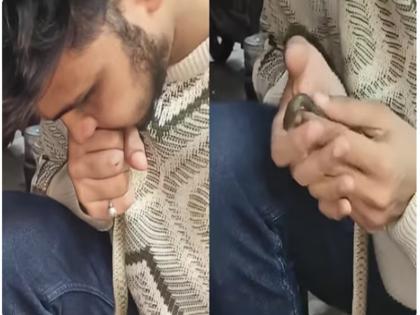 Gujarat man revives lifeless snake using CPR Watch | WATCH: गुजरात के एक व्यक्ति ने माउथ-टू-माउथ CPR देकर बेजान सांप को किया पुनर्जीवित Gujarat man revives lifeless snake using CPR Watch | WATCH: गुजरात के एक व्यक्ति ने माउथ-टू-माउथ CPR देकर बेजान सांप को किया पुनर्जीवित