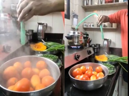 New jugad of sanitizing vegetables with cooker steam video viral on internet | Viral Video: कुकर के स्टीम से सब्जियों को सैनेटाइज करने का नया जुगाड़ हो रहा वायरल, देखें वीडियो