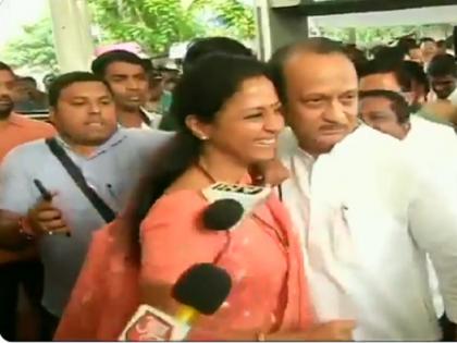 Supriya Sule welcomed hugs Ajit Pawar Mike comes in between video goes viral | सुप्रिया सुले ने भाई अजित पवार को लगाया गले तो बीच में आ गया माइक, वायरल वीडियो में देखें फिर क्या हुआ