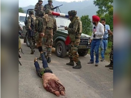 The explanation to the alleged dragging of terrorist by army in jammu kashmir | कश्मीर: आतंकियों के शव को रस्सी में बांध घसीटते हुए ले जाने पर सेना ने दी ये सफाई, वायरल हुई थी तस्वीर