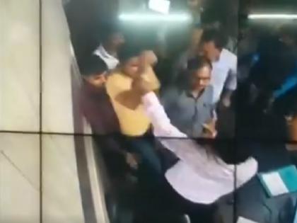 uttar pradesh BJP leader Rahul Dev Agnihotri & his son thrashed a toll plaza employee in Kanpur Dehat | UP:सत्ता के नशे में चूर बीजेपी नेता और बेटे ने की टोलकर्मी के साथ मारपीट, सीसीटीवी फूटेज आया सामने uttar pradesh BJP leader Rahul Dev Agnihotri & his son thrashed a toll plaza employee in Kanpur Dehat | UP:सत्ता के नशे में चूर बीजेपी नेता और बेटे ने की टोलकर्मी के साथ मारपीट, सीसीटीवी फूटेज आया सामने