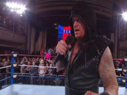 wwe raw 25 years undertaker returns in ring monday night anniversary | WWE Raw के 25 साल के मौके पर फिर रिंग में उतरे अंडरटेकर, खोला ये बड़ा राज