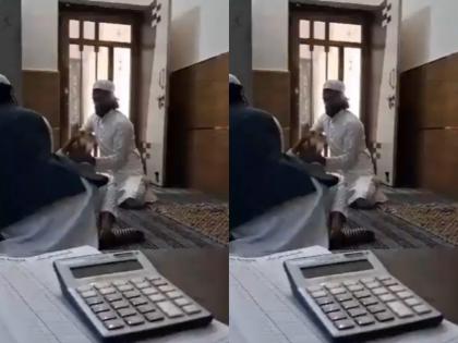 Teachers beat 10-year-old in UP madrasa; one holds him down, another strikes with stick | यूपी के मदरसे में शिक्षकों ने 10 साल के बच्चे को पीटा, एक ने उसे पकड़कर रखा, दूसरे ने डंडे से मारा, VIDEO Teachers beat 10-year-old in UP madrasa; one holds him down, another strikes with stick | यूपी के मदरसे में शिक्षकों ने 10 साल के बच्चे को पीटा, एक ने उसे पकड़कर रखा, दूसरे ने डंडे से मारा, VIDEO