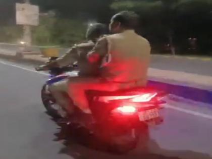 UP Ghaziabad police video riding bike without helmet going viral, girls chasead and makes video | 'भैया हेलमेट कहा है....', दो लड़कियों के इस वीडियो ने कटा दिया पुलिसवालों का ही चालान, सोशल मीडिया पर हुआ वायरल