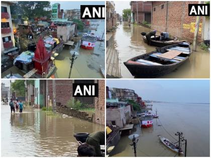 UP Flood Many ghats submerged in Varanasi PM Modi expressed concern prayagraj etawah | UP Flood: वाराणसी में कई घाट डूबे, गलियों में किया जा रहा शवों का दाह संस्कार, पीएम मोदी ने जताई चिंता, जानें और शहरों का हाल
