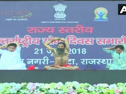 baba ramdev vasundhara raje world records 2 lakh people International Yoga Day | राजस्थान: कोटा में योग का वर्ल्ड रिकॉर्ड, बाबा रामदेव के कार्यक्रम में एक साथ 2 लाख लोगों ने किया योग