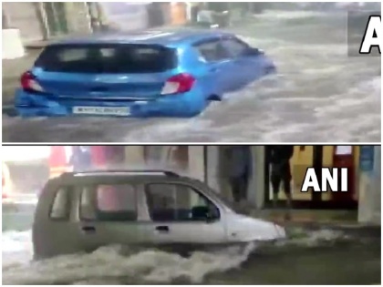 Video Cars were washed away water due to the strong current in jodhpur rajasthan rainfall flood news cm gehlot | Video: तेज बहाव के कारण पानी में एक-एक करके बह गई कारें, वहां खड़े लोग बस देखते ही रह गए