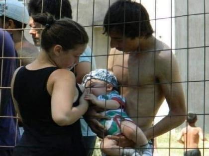 Fact Check: Viral Photo of Woman breastfeeding baby across fence is not from Indian detention camp | Fact Check: NRC से जोड़कर पेश की जा रही बच्चे को दूध पिला रही मां की तस्वीर, सच्चाई जान रह जाएंगे हैरान
