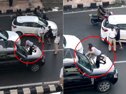 Mumbai wife allegedly her husband with another lady Viral video What happens | वीडियो: 'गेट आउट ऑफ माय कार', हाथ में चप्पल लेकर कार की बोनेट पर चढ़ी महिला, पति अंदर था मौजूद, जानें आगे क्या हुआ