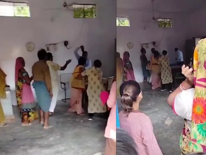 viral video shows how up lakhimpur kheri govt school principal ajit kumar beat women teacher with shoes | देखें वीडियो: प्रिंसिपल ने महिला टीचर को जूते से कर दी पिटाई तो शिक्षामित्र ने भी किया पलटवार, वीडियो वायरल होने पर हुई कार्रवाई