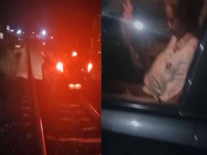 viral video shows kerala Anjarakandy man try to drive car in railway track arrested | Viral Video: नशे में धुत रेलवे ट्रैक पर गाड़ी चलाता दिखा शख्स, पुलिस ने किया गिरफ्तार