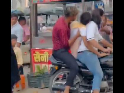 viral video Four young men were arrested in Uttar Pradesh for staging fake kidnapping to film | फिल्मी स्टाइल में सरेआम शख्स का अपहरण, चाट खाते हुए बाइक पर उठा ले गए लोग..., वीडियो देख दंग रह गए लोग viral video Four young men were arrested in Uttar Pradesh for staging fake kidnapping to film | फिल्मी स्टाइल में सरेआम शख्स का अपहरण, चाट खाते हुए बाइक पर उठा ले गए लोग..., वीडियो देख दंग रह गए लोग