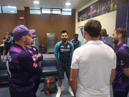 T20 World Cup Virat Kohli, Rohit Sharma Jasprit Bumrah and Ravichandran Ashwin visit Scotland dressing room share 'priceless' experience | T20 World Cup: 39 गेंद में जीते, स्कॉटलैंड ड्रेसिंग रूम में पहुंचे टीम इंडिया के कई दिग्गज खिलाड़ी, फैंस खुश, फोटो वायरल