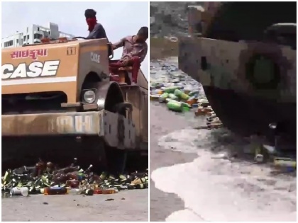 Watch Road roller illegal liquor worth 56 lakhs alcohol ban lakhs rupees surat city shed road Gujarat Police see video | Watch: 56 लाख के अवैध शराब पर ऐसे चला रोड रोलर, गुजरात पुलिस द्वारा नष्ट कर सड़क पर बहाया गया, देखें वीडियो