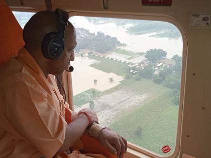 UP Weather Update flood in 15 districts CM Yogi assessment doing aerial survey more than 50 people died due heavy rain lightning 2 days | UP Weather Update: 15 जिलों में बाढ़ से हाहाकार, हवाई सर्वे कर सीएम योगी ने किया आंकलन, 2 दिन में भारी बारिश और बिजली गिरने के 50 से अधिक लोगों की मौत