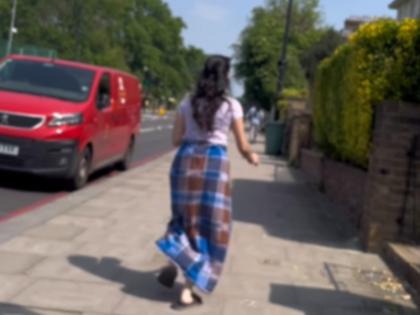Watch Woman seen in lungi on the streets of London stuns people video goes viral | Watch: लंदन की सड़कों पर लुंगी में दिखीं महिला, लोगों ने दिए ऐसे रिएक्शन; मजेदार वीडियो वायरल