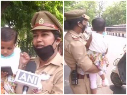 uttar pradesh lacknow female soldier doing duty on 2.5 year old-child dgp said this by calling | Corona Warriors: ढाई साल की बेटी को आंचल में छुपा ये महिला SI करवा रही लोगों से लॉकडाउन का पालन