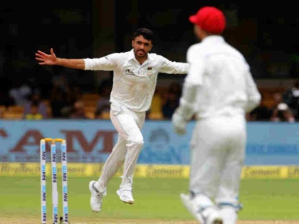 IND vs AFG: Yamin Ahmadzai becomes first bowler to take test wicket for Afghanistan | IND vs AFG: इस अफगानी गेंदबाज ने धवन को आउट कर किया कमाल, रिकॉर्ड बुक में दर्ज कराया अपना नाम