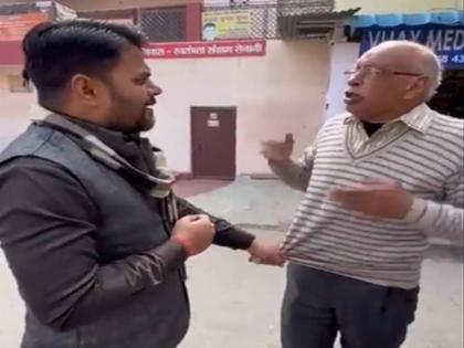 UP Election 2022 kanpur BJP councillor Raghvendra Mishra threatened old man pulling clothes Rahul Gandhi targets BJP viral video | "भाजपाई हो..कहो भाजपाई हैं..जैसी भाषा में समझोगे, वैसी ही भाषा में समझाएंगे", भाजपा पार्षद ने बुजुर्ग के कपड़े खींच धमकाया; वीडियो वायरल UP Election 2022 kanpur BJP councillor Raghvendra Mishra threatened old man pulling clothes Rahul Gandhi targets BJP viral video | "भाजपाई हो..कहो भाजपाई हैं..जैसी भाषा में समझोगे, वैसी ही भाषा में समझाएंगे", भाजपा पार्षद ने बुजुर्ग के कपड़े खींच धमकाया; वीडियो वायरल