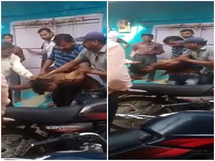 Questioning the toilet-housing scheme in MP the tribal youth beaten by constable including panchayat staff in katni | Video: MP में शौचालय-आवास योजना पर सवाल करना आदीवासी युवक को पड़ गया भारी, पंचायत स्टाफ समेत सिपाही ने कर दी जमकर पिटाई Questioning the toilet-housing scheme in MP the tribal youth beaten by constable including panchayat staff in katni | Video: MP में शौचालय-आवास योजना पर सवाल करना आदीवासी युवक को पड़ गया भारी, पंचायत स्टाफ समेत सिपाही ने कर दी जमकर पिटाई