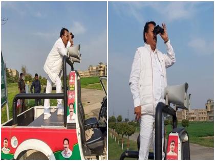 UP Election 2022 SP candidates yogesh varma monitoring EVM machines with binoculars party workers put on duty for 8 hours a day | Photo: अखिलेश यादव के निर्देश पर EVM की निगरानी कर रहे हैं सपा प्रत्याशी योगेश वर्मा, दूरबीन से लिया खुद जायजा, कार्यकर्ताओं को लगाया 8-8 घंटे की शिफ्ट पर