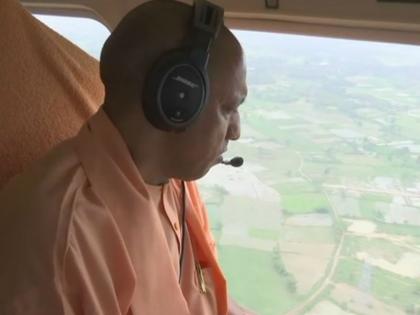 CM Yogi Adityanath conducts aerial survey of security arrangements on Kawad Yatra route in Meerut | हेलीकॉप्टर से हाथ हिलाते हुए CM योगी ने किया अभिवादन, लोगों ने उड़ाया मजाक CM Yogi Adityanath conducts aerial survey of security arrangements on Kawad Yatra route in Meerut | हेलीकॉप्टर से हाथ हिलाते हुए CM योगी ने किया अभिवादन, लोगों ने उड़ाया मजाक