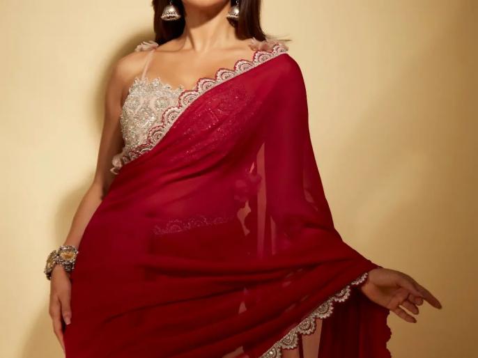 Nushrratt Bharuccha looks stunning in red saree and pink bralette