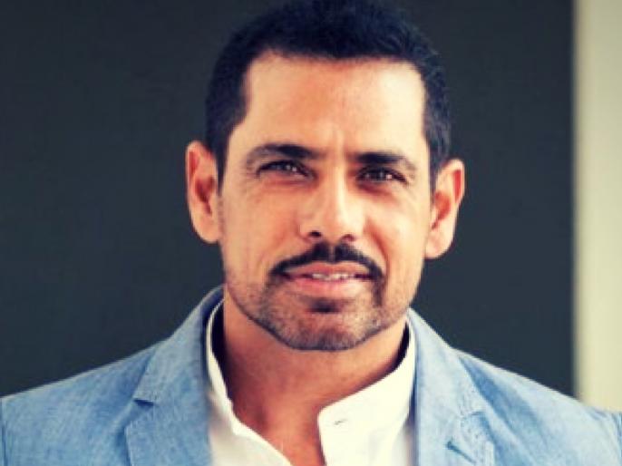 Robert Vadra relatives ED investigation bjp says Robert Vadra is corrupted | राबर्ट वाड्रा के करीबियों पर छापेमारी जारी, बीजेपी ने कहा- वाड्रा 'भ्रष्टाचार का मूलस्रोत’ Robert Vadra relatives ED investigation bjp says Robert Vadra is corrupted | राबर्ट वाड्रा के करीबियों पर छापेमारी जारी, बीजेपी ने कहा- वाड्रा 'भ्रष्टाचार का मूलस्रोत’
